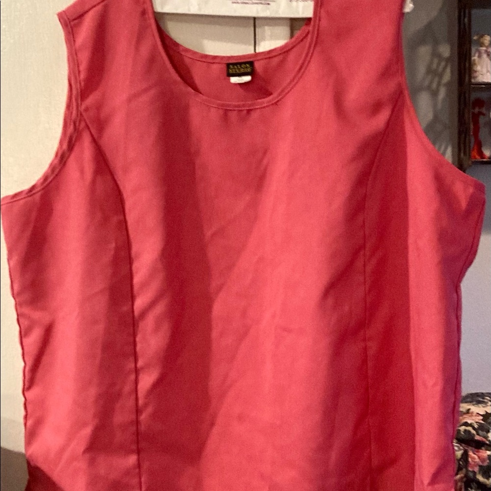 Size XX CORAL SLEEVELESS TOP.